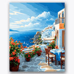 Paint by numbers design of seaside terrace, red flowers, vibrant red flowers, white stucco buildings
