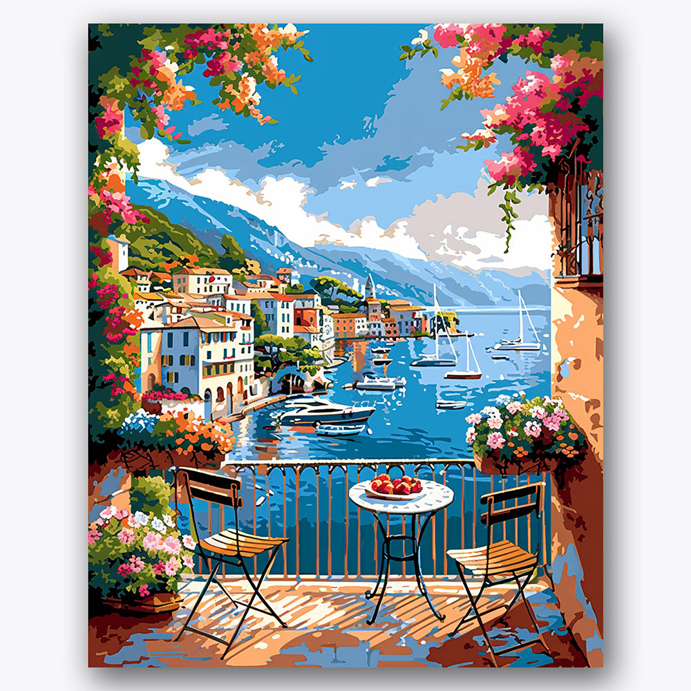 Paint by numbers design of coastal village, flowering balcony, vibrant flowers, rolling mountains