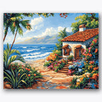 Paint by numbers design of seaside cottage, ocean waves, lush flower garden, red-tiled roof
