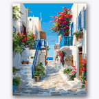 Paint by numbers design of alleyway, flowers, white buildings, vibrant flowers