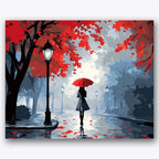 Paint by numbers design of person, red umbrella, vibrant red leaves, red umbrella accent