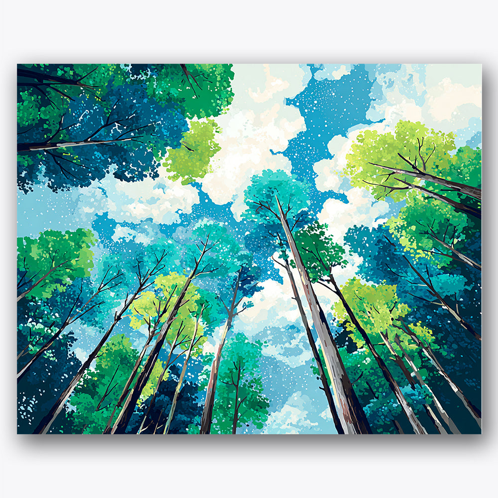 Paint by numbers design of tree canopy, blue sky, tall tree trunks, vivid blue sky