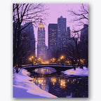 Paint by numbers design of cityscape, bridge, snow-covered bridge, glowing streetlights